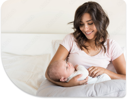 A mother is holding her baby.