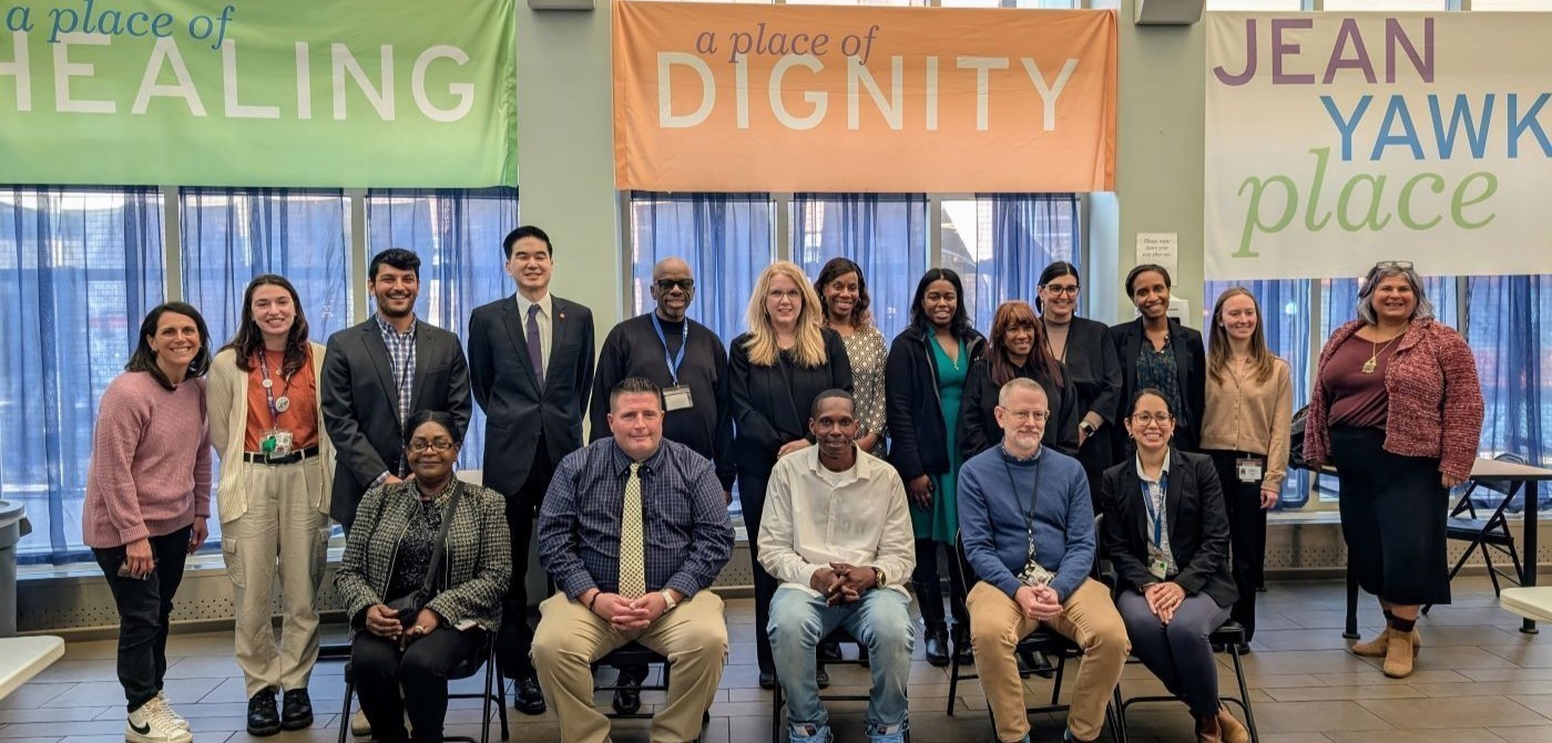 Group photo of HRSA staff, community leaders, and staff from Boston Health Care for the Homeless Program. 