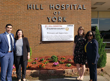Group portrait of staff from HRSA's FORHP and the Alabama State Office of Rural Health. 