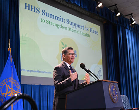 HRSA Administrator Carole Johnson and HHS Deputy Chief of Staff Angela Ramirez seated together on stage at the HHS Mental Health Summit. 
