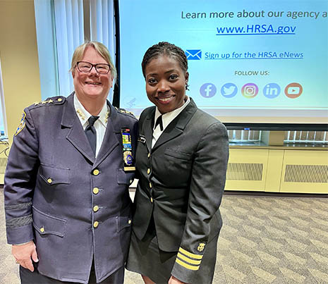 A portrait of staff member from the New York City Police Department and HRSA’s Wanda Pamphile (on right). 