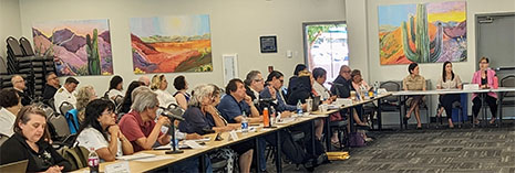 Attendees of HRSA's Office of Intergovernmental and External Affairs and HHS' Regional Tribal Consultations are seated together at tables in a conference room.