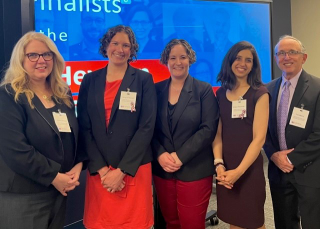 Group portrait, from left, HRSA Administrator Johnson; awardees Megan Meacham, Allison Hutchings, and Sarah O’Donnell; and HRSA Associate Administrator Tom Morris. 