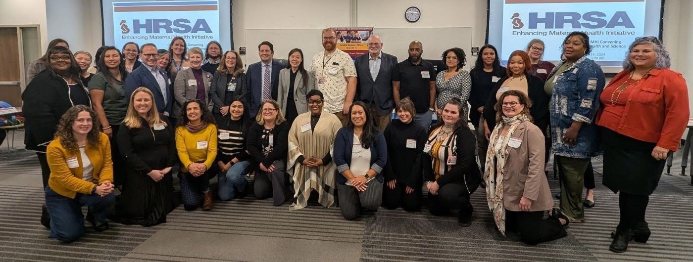 Group photo of HRSA staff and attendees at the Oregon convening of the HRSA Enhancing Maternal Health Initiative. 