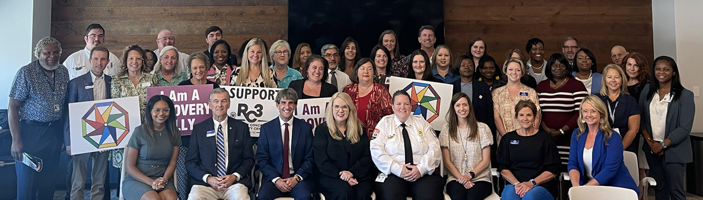 A large group portrait that includes HRSA Administrator Carole Johnson and members of the Wilson County Substance Prevention Coalition.