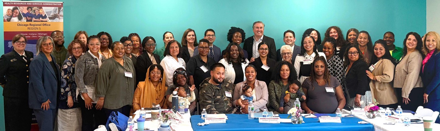 Group portrait of 40 attendees at the Illinois Convening of the Enhancing Maternal Health Initiative.