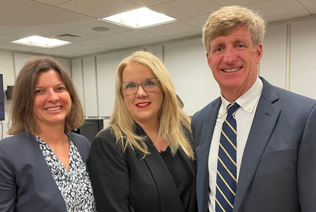 Group portrait of HRSA Administrator Carole Johnson, Teri Tanielian, and Patrick J. Kennedy.