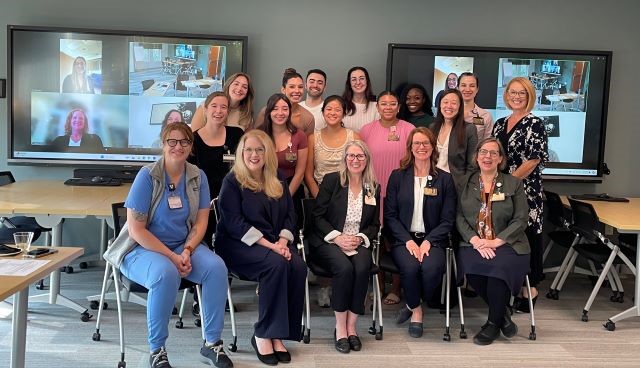 A group portrait of HRSA Administrator Carole Johnson with health care professionals.